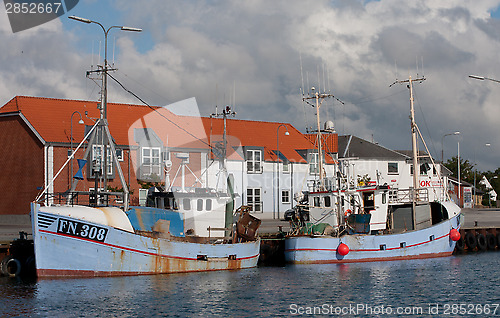 Image of Blue boat in harbour