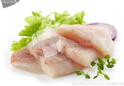 Image of raw hake fish fillet pieces