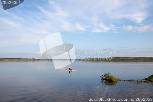 Image of Little surfer on the lake
