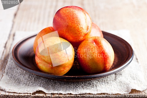 Image of fresh nectarines in a plate
