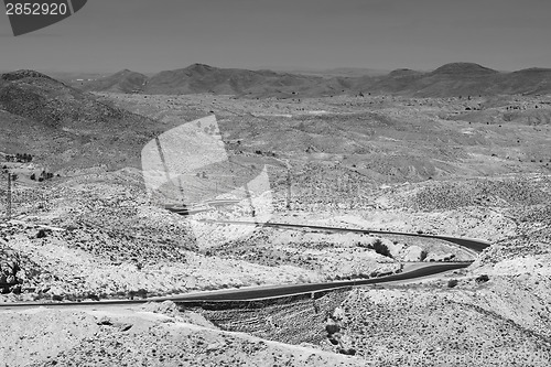 Image of Road passing through Sahara desert black and white