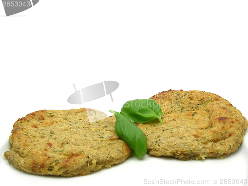 Image of Round flat potato dough cakes with basil