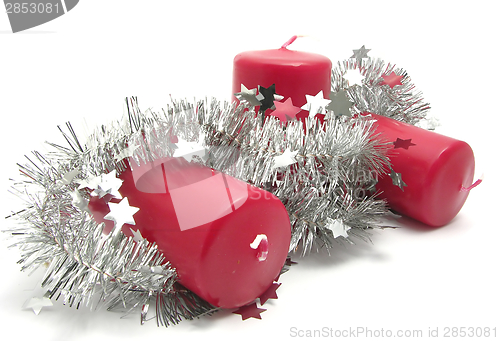 Image of Red candles with christmas decoration