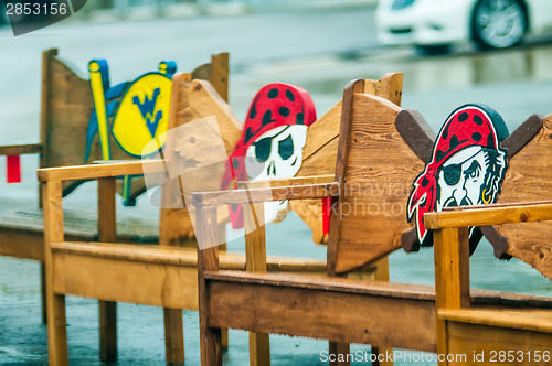 Image of wood carved pirate chairs