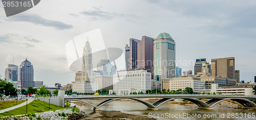 Image of Columbus Ohio skyline and downtown streets in late afternoon
