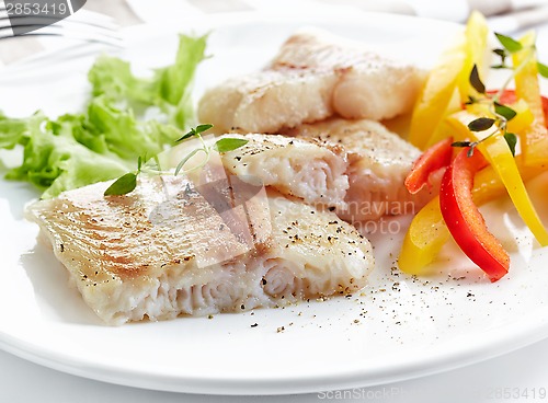 Image of fried pangasius fish fillet pieces