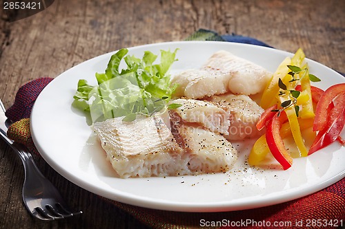 Image of fried pangasius fish fillet pieces