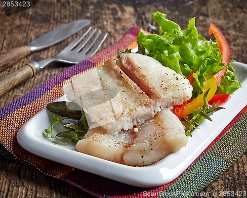 Image of fried pangasius fish fillet pieces