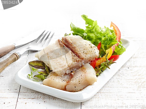 Image of fried pangasius fish fillet pieces