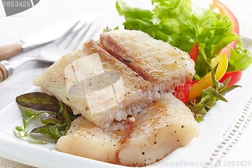 Image of fried pangasius fish fillet pieces