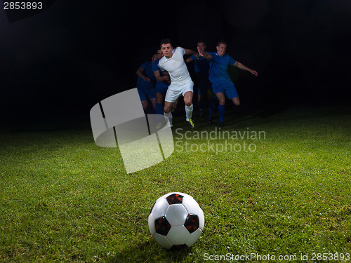 Image of soccer players duel