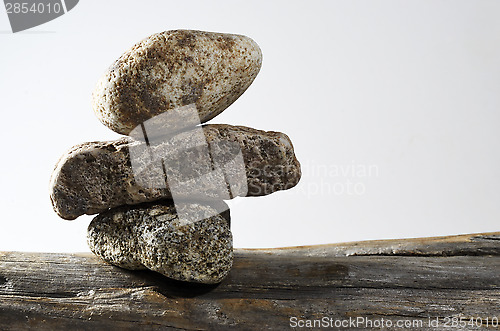 Image of three stones on each other