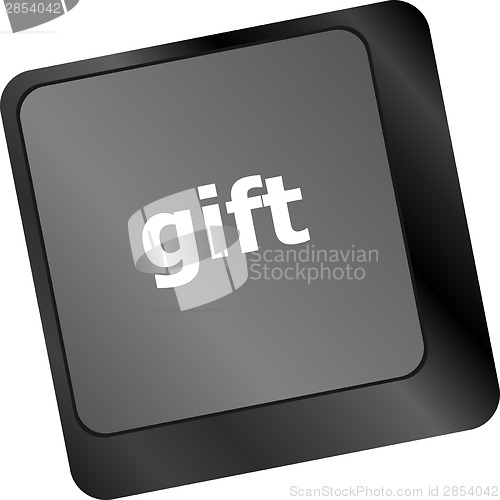 Image of Computer keyboard with gift key - business background