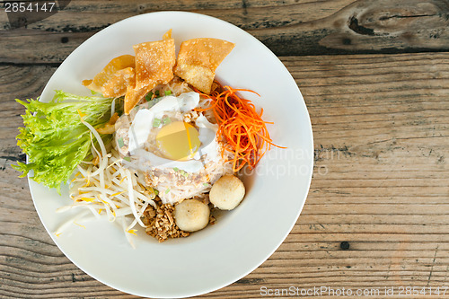 Image of Thai Noodle Dish with Fried Egg