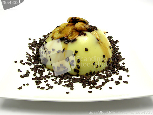 Image of Custard with sliced banana and grated chocolate