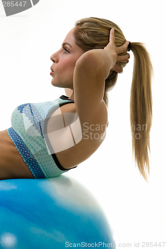 Image of Woman doing sit ups