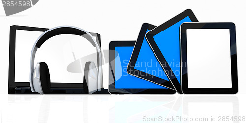 Image of headphones on the  laptop and  tablet pc
