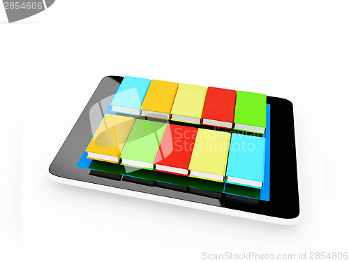 Image of tablet pc and colorful real books