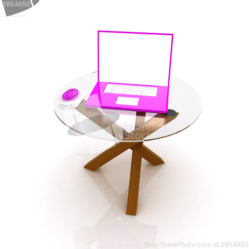 Image of pink laptop on an exclusive table