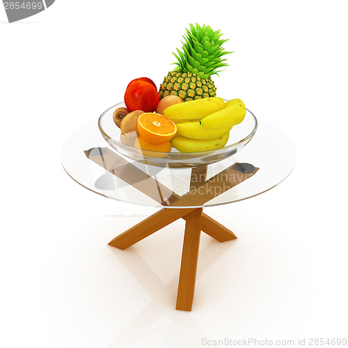 Image of Citrus in a glass dish on exotic glass table with wooden legs