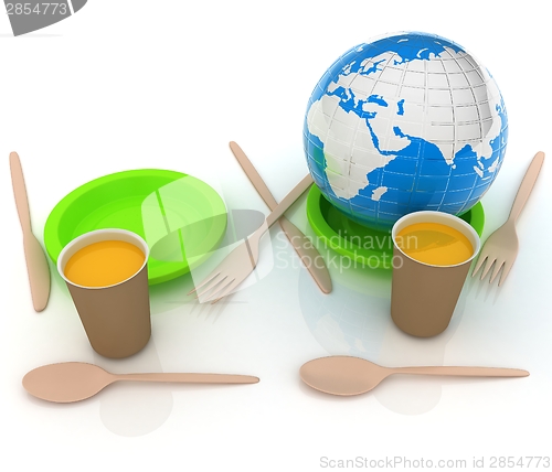 Image of Orange juice in a fast food dishes and earth