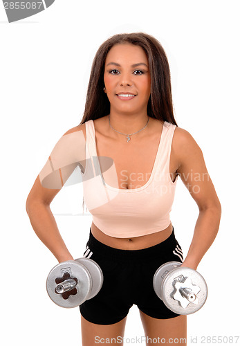 Image of Woman lifting dumbbell's.