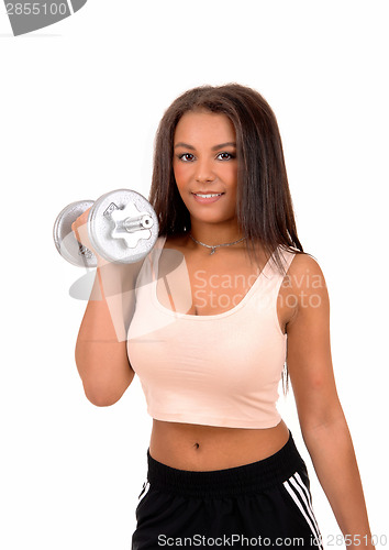 Image of Woman lifting a dumbbell.