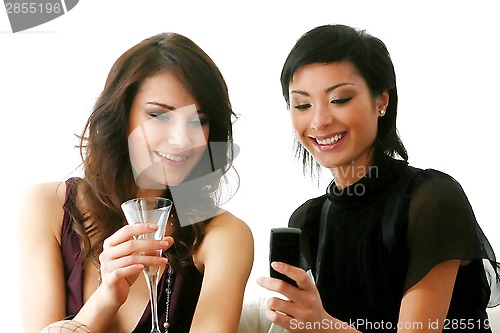 Image of girls checking out their new mobilephone