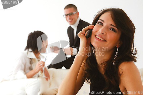 Image of woman speaks on a mobile phone l