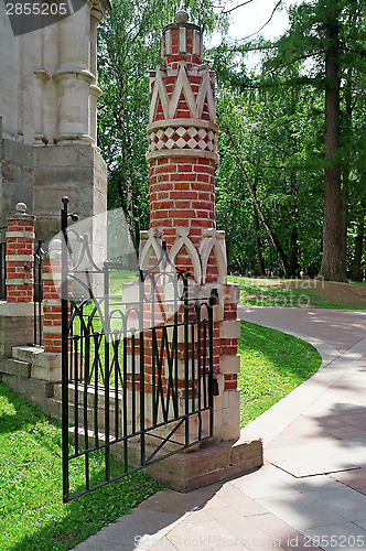 Image of Wicket of red brick decorated with white pattern