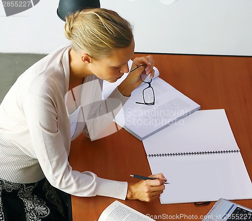 Image of blonde businesswoman in office