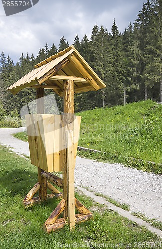 Image of Wooden trash can