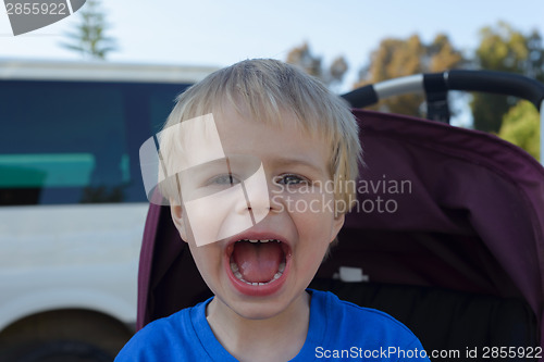 Image of Happy little boy with his mouth open