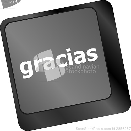 Image of Computer keyboard keys with word Gracias, Spanish thank you
