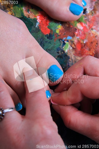 Image of colored nails (pedicure) and color palette 