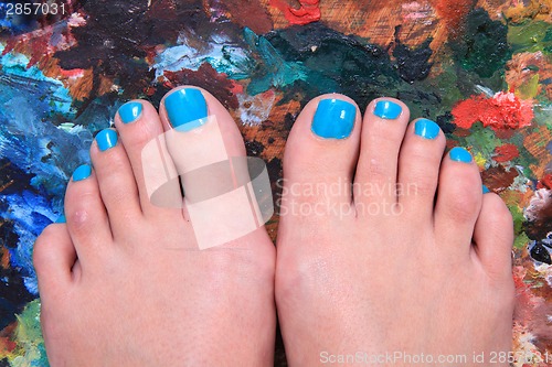 Image of colored nails (pedicure) and color palette 