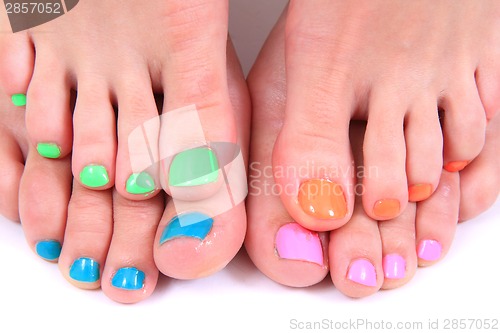 Image of pedicure (color nails) and women feet