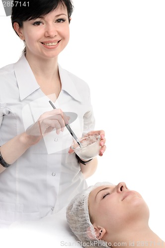 Image of beauty salon, facial mask applying