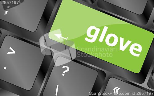 Image of glove word on keyboard key, notebook computer button