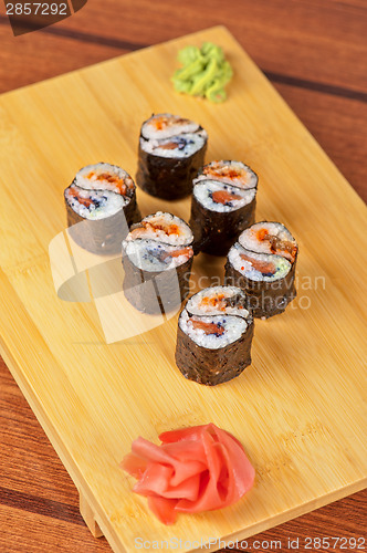 Image of sushi rolls with tobico and pancake