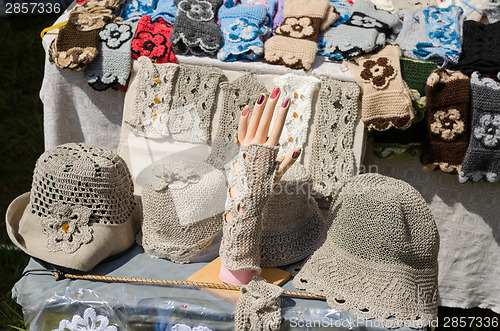 Image of female linen hats and wristlets at market trade 