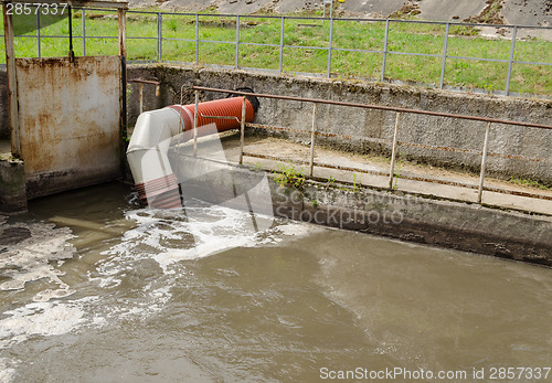 Image of city sewage waste water and garbage flow pipe tube 