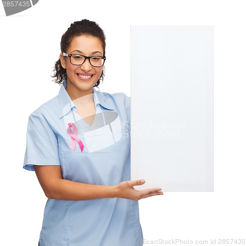 Image of female doctor or nurse with white blank board