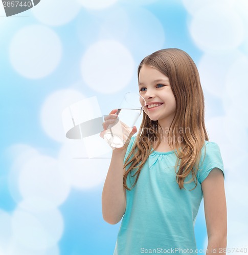 Image of smiling little girl with glass of water