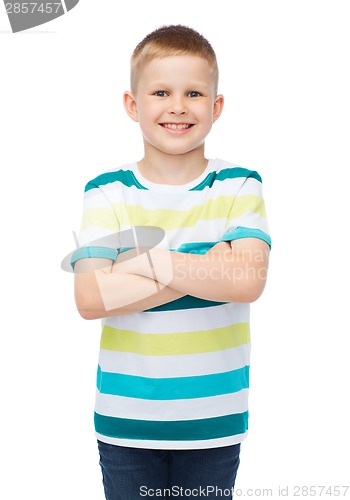Image of little boy in casual clothes with arms crossed