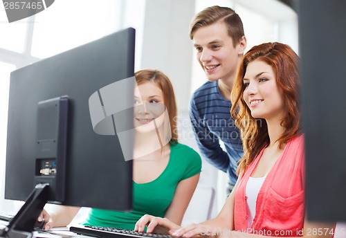 Image of group of smiling students having discussion