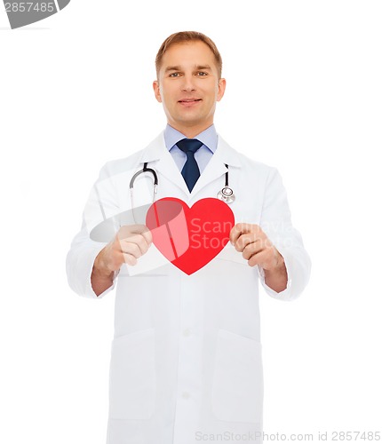 Image of smiling male doctor with red heart
