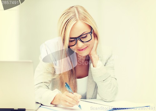 Image of businesswoman with documents