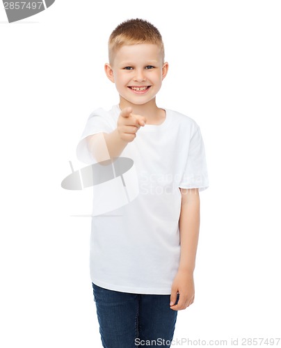 Image of little boy in blank white t-shirt pointing at you