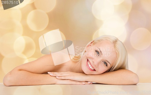 Image of clean face and shoulders of beautiful young woman